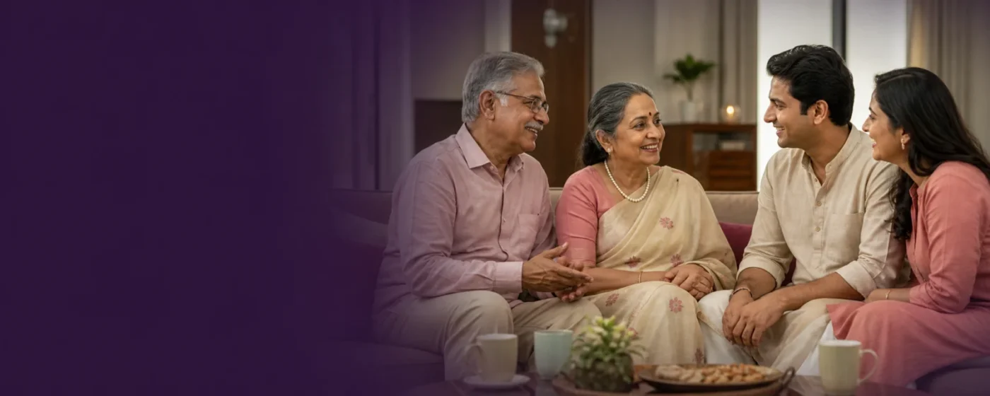 A happy Indian senior couple enjoying a family conversation at home